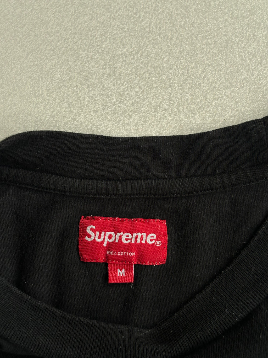 Supreme Intarsia Spellout S/S Top Black – SS21