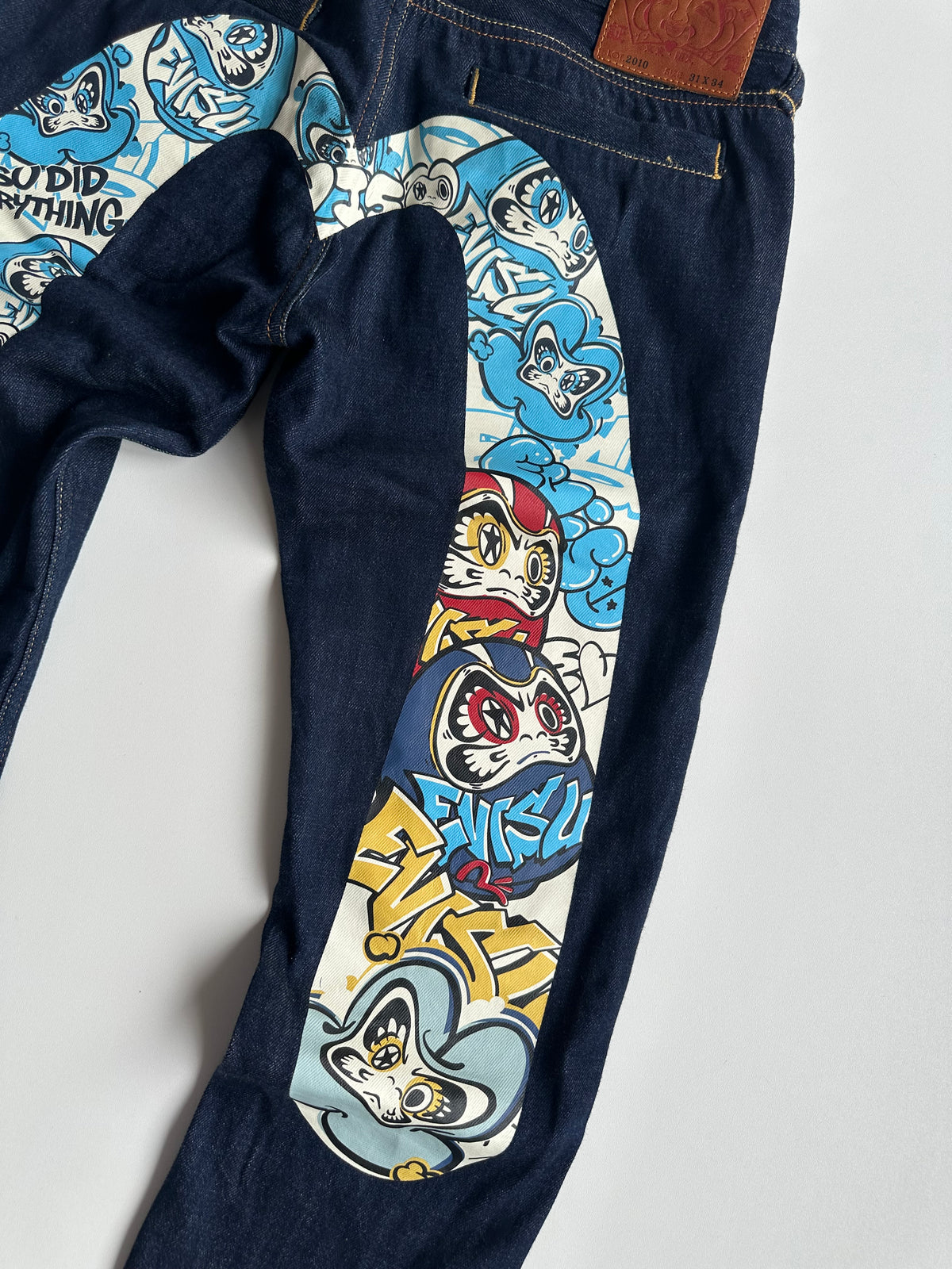 EVISU Graffiti Daruma Daicock Slim Fit Jeans #2010 Indigo – SS23 – W30 L34